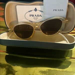 Prada Gold Aviator Sunglasses with Dark-Tinted Lenses